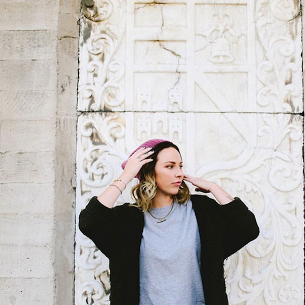 Brass necklace on young hipster girl